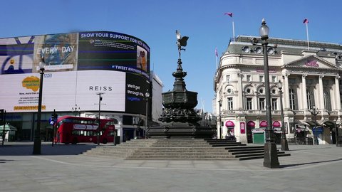 London UK April 20th 2020 . First Covid-19 Pandemic lockdown at Piccadilly Circus Statue of Eros in London. All shops and attractions closed, empty streets.