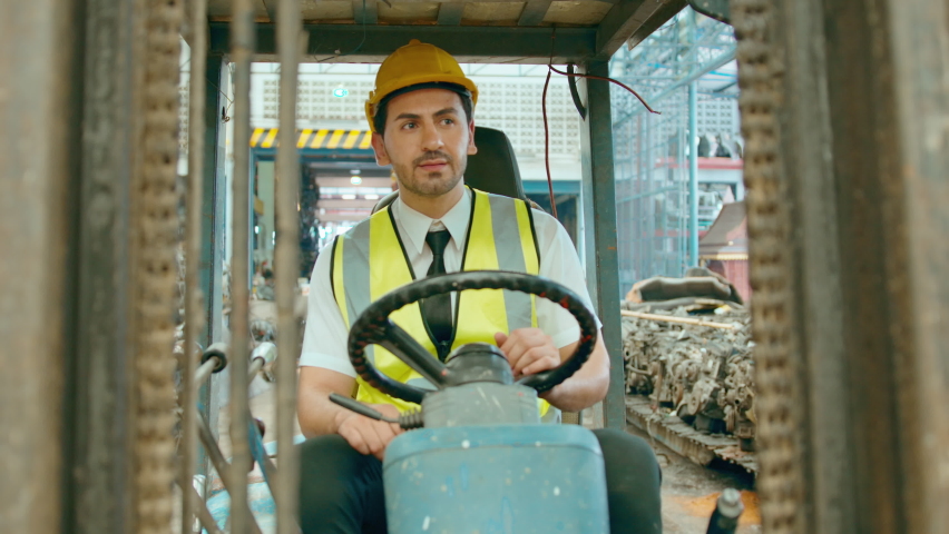  Engineering people are working in heavy industrial plant Engine parts factory .