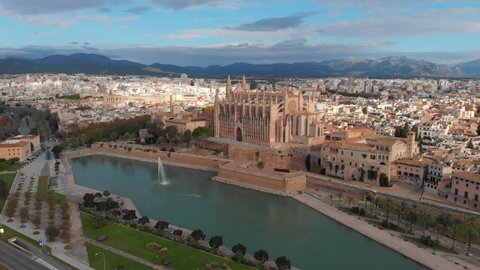 Palma de Mallorca cityscape. Cathedral La Seu of Santa Maria Royal Palace of La Almudaina, old architecture drone top point of view, sunny day. Travel, landmark, famous place. Balearic Islands. Spain
