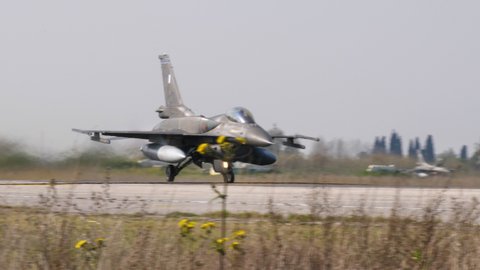 Andravida Airport Greece 04.03.2019 Supersonic combat jet airplane takeoff run with full afterburner. Lockheed Martin F-16 Viper of Hellenic Air Force