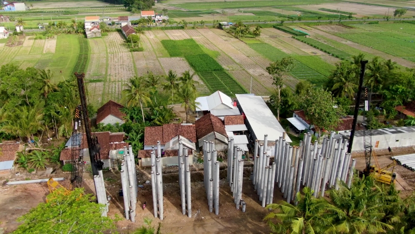 Monorail construction site drilling bore pile foundation, Java, Indonesia, aerial