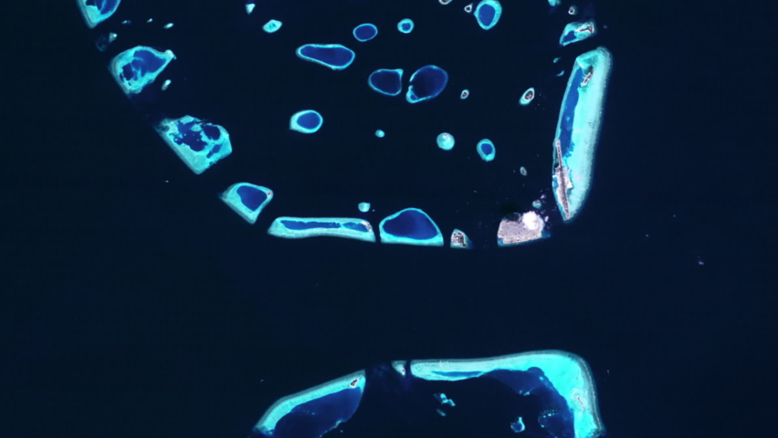 Human presence and constructions growth time lapse in Maldive islands atoll, aerial satellite view animation. Images furnished by Nasa