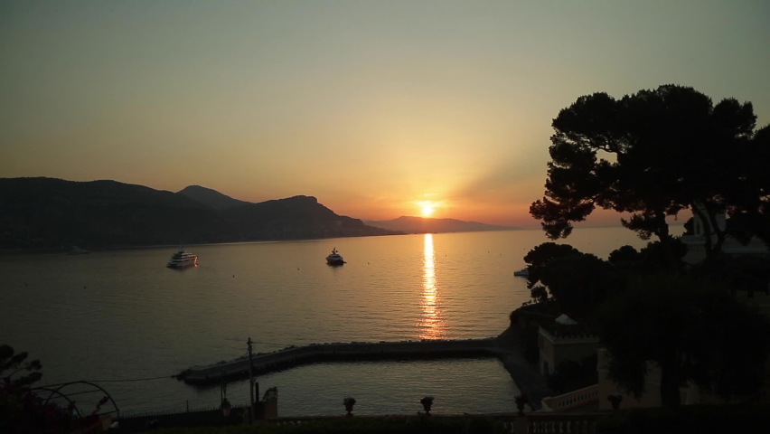 A red sunset is coming on this little harbor in southern France