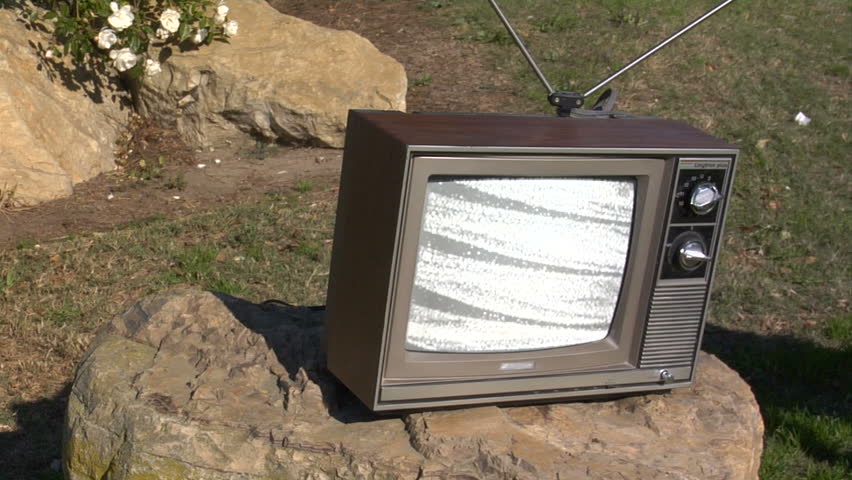 retro tv on a Rock in the park.