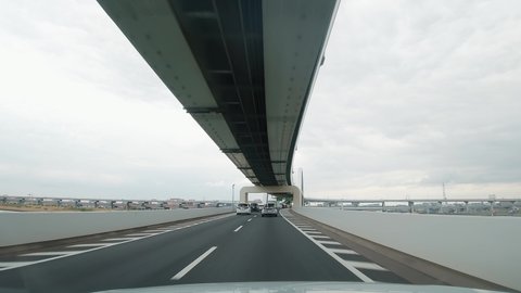Video of In-vehicle camera. Dashboard camera. Driver point of view. Japanese translation:"highway","speed down"