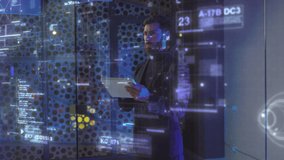 Adult Businessman in Office Standing by Infographics Screen Examining Corporate Business Data on Futuristic Interactive Hologram Technology at Office. AI Concept. - Powered by Shutterstock - Get 15% off with code: PIKWIZARD15