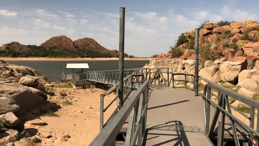 Walkway with a dock at the Lake Altus-Lugert at Quartz Mountain, southern Oklahoma.