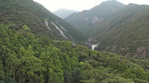 Aerial reveal of Senpiro Waterfall of Yakushima Island, Kagoshima Japan