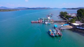 Professional Video. Aerial view Fishing boat station. Andaman sea south of thailand. At Phuket, Thailand.