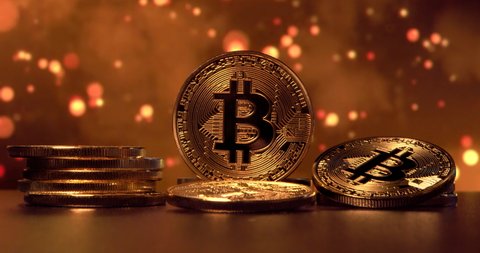 Bitcoin. Cryptocurrency Gold Bitcoin, BTC, Bit Coin. Macro shot of Bitcoin coins background Blockchain financial technology, mining concept, fintech, DEFI. High quality 4k footage
