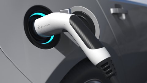 Charging electric car plug with MERCEDES-BENZ logo on it. Editorial conceptual 3d animation