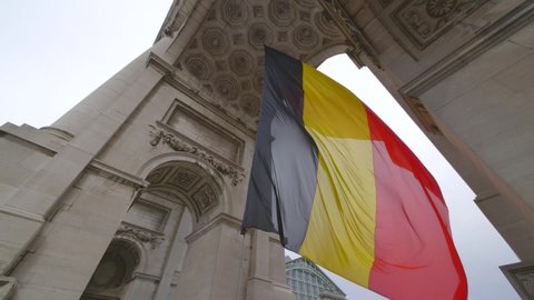 Belgian Flag Under Triumphal Arch in Brussels. High quality