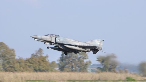 Andravida Greece APRIL, 03, 2019 Take off of a supersonic military combat plane in Slow Motion. McDonnell Douglas F-4 Phantom II of Hellenic Air Force HAF