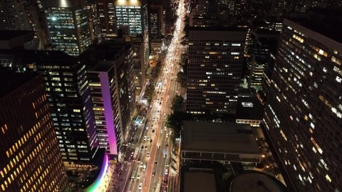Paulista Avenue, Sao Paulo, Brazil. Night landscape of landmark of city. Paulista Avenue attraction at downtown of Sao Paulo with traffic in motion. Sao Paulo at night. Illuminated avenue, Sao Paulo.