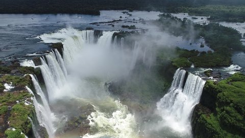 Iguaçu Falls, Brazil. Waterfall aerial landscape. Natural beauties preservation. Iguazu Waterfalls, Paraná, Brazil. Iguazu Falls, Brazil. Waterfall aerial landscape. Natural beauties preservation. 