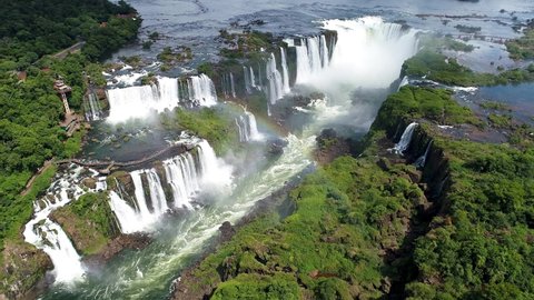 Iguazu Falls, Brazil. Waterfall aerial landscape. Natural beauties preservation. Iguazu Waterfalls, Paraná, Brazil. Waterfall aerial panorama. Iguacu Falls, Parana, Brazil. Forest preservation.