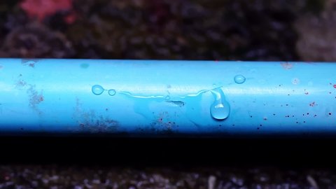 Leaked PVC pipe with leaked water.                        