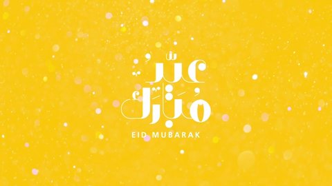 Eid Mubarak ,Eid Al Adha and Eid Al Fitr Happy holiday written in arabic calligraphy. Eid mubarak on yellow glittered color background with golden particles. 