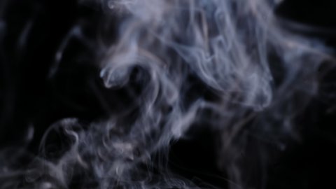 Abstract white smoke isolated on black background, Close up.