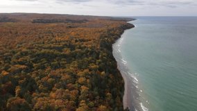 4k drone video of fall colors along Lake Michigan in Michigan.