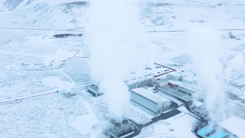Svartsengi Geothermal Power Plant in Iceland with rising steam covered in snow