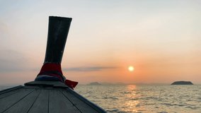 Landscape of the head front of local boat while sailing in sea ocean in early morning time