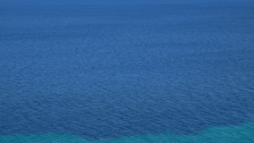 Aerial view 4k stock video footage of beutiful blue sea water texture. Abstract natural background