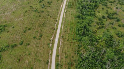 White Car Driving on Country Road in Ryazhsk