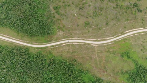 Aerial View of White Car Driving on Country Road Near Ryazhsk