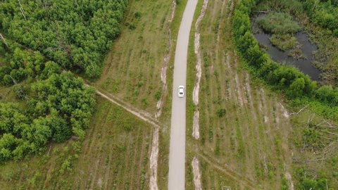 White Car Driving on Country Road in Ryazhsk, Aerial View