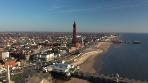 4K: Aerial Drone Video of The Blackpool Tower, England, UK. Flying down the Coast towards the landmark. Stock Video Clip Footage