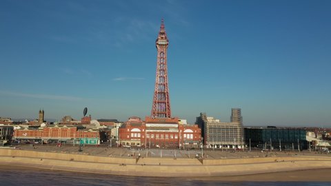 4K: Aerial Drone Video of The Blackpool Tower, England, UK. Flying over the sea towards the landmark. Stock Video Clip Footage