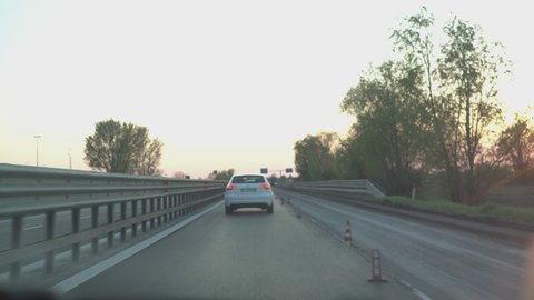 ROME, ITALY 25 APRIL 2021: Italian highway travel at sunset