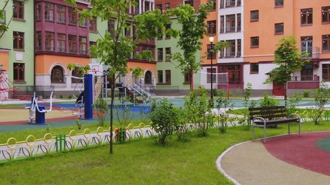 Modern playground in apartment courtyard