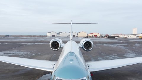 Expensive business jet waiting on tarmac for next flight at Iceland airport