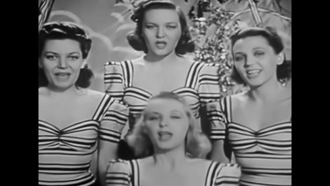 CIRCA 1940s - Four women sing in a quartet in this 1940s soundie musical.