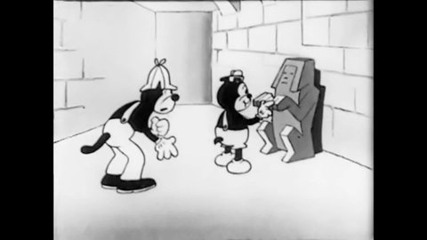 CIRCA 1930 - In this animated film, a cat plays a piano duet with a skeleton in an Egyptian tomb.