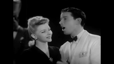 CIRCA 1940s - Formal ballroom dancing is featured in this 1940s soundie musical.