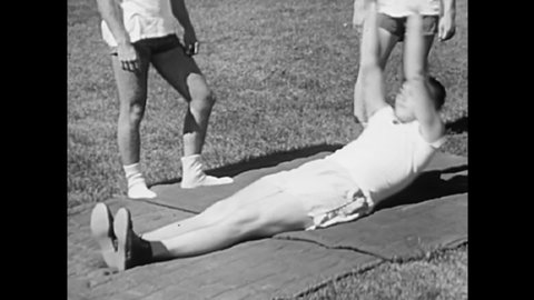 CIRCA 1950s - Physical education students are taught about nutrition and do various exericses for gym class in 1951.