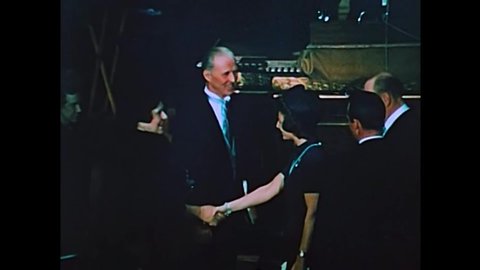 CIRCA 1970s - Dr. Norman E. Borlaug accepts his Nobel Peace Prize in 1970 and the sun rises over mountains in 1971.