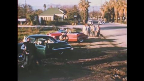 CIRCA 1950s - Cops break up a gang fight in the 1950s.