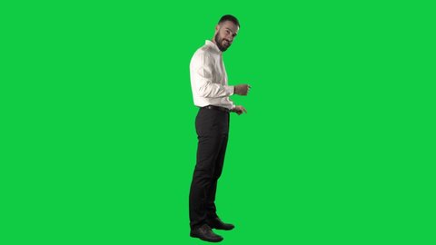Happy business man beckoning and inviting you to join team. Full length on green screen chroma key background