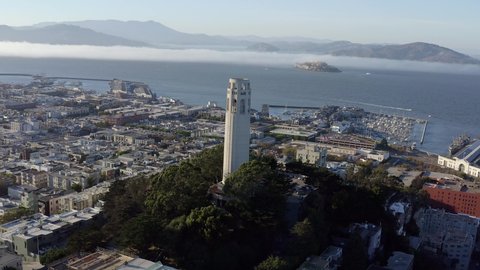 Aerial, San Francisco Coit Tower and cityscape, panning right drone 02.