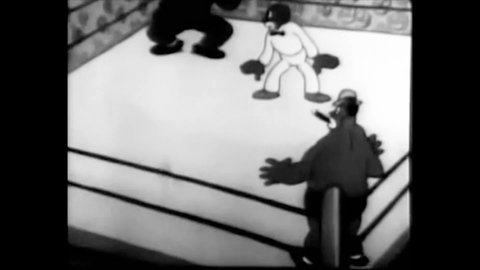 CIRCA 1934 - In this animated film, Amos tries to help Andy win a wrestling match against the heavyweight champion.