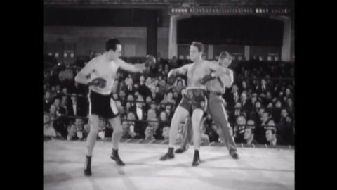 CIRCA 1936 - In this comedy movie, a timid boxer gets ahead in a fight just by trying to get his good luck charm back from his unaware opponent.