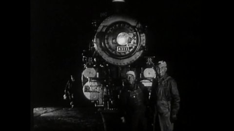 CIRCA 1932 - In this thriller, a train conductor brings his locomotive to a sudden stop at night because he thinks he saw an oncoming train.