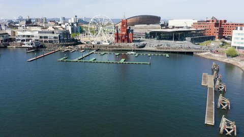 CARDIFF, WALES - APRIL 23 2021: Aerial drone view of the landmark buildings of Cardiff Bay.  Cardiff is the capital city of Wales.