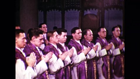 CIRCA 1954 - Seminary students are anointed by a bishop to conclude their ordination ceremony, and one newly ordained man blesses his parents.