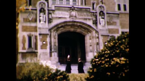 CIRCA 1954 - Theologians enter a major seminary campus.