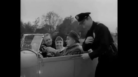 CIRCA 1957 - In this teen movie, a prominent man gets pulled over for speeding in his son's hot rod.